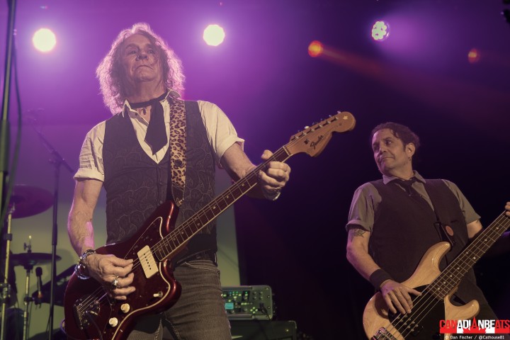 Rough Trade guitarist and bassist performing together under purple stage lighting at Maxwell's in Waterloo, Ontario.
