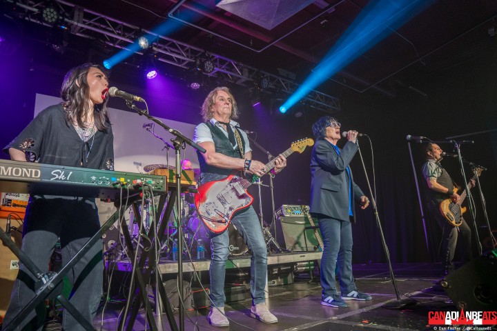 Carole Pope and Rough Trade performing together onstage with guitar, bass, keyboards and drums at Maxwell's in Waterloo.