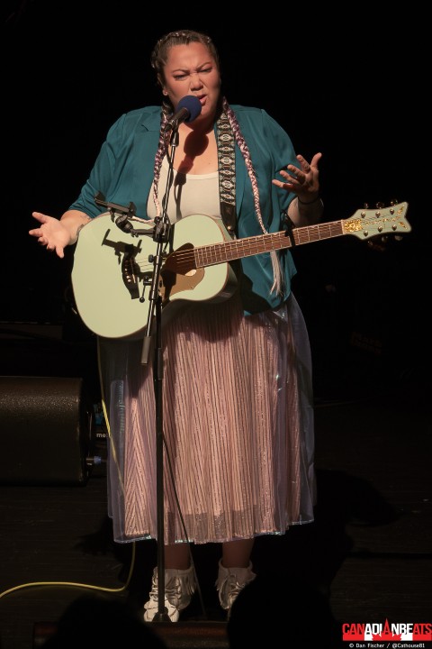 Lacey Hill on stage at River Run Centre during She Carries the Song